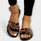 Panthermuster Sandalen mit gekreuzten Riemen